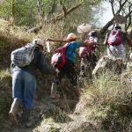 Farmers climbing volcano Santa Maria in Xela
