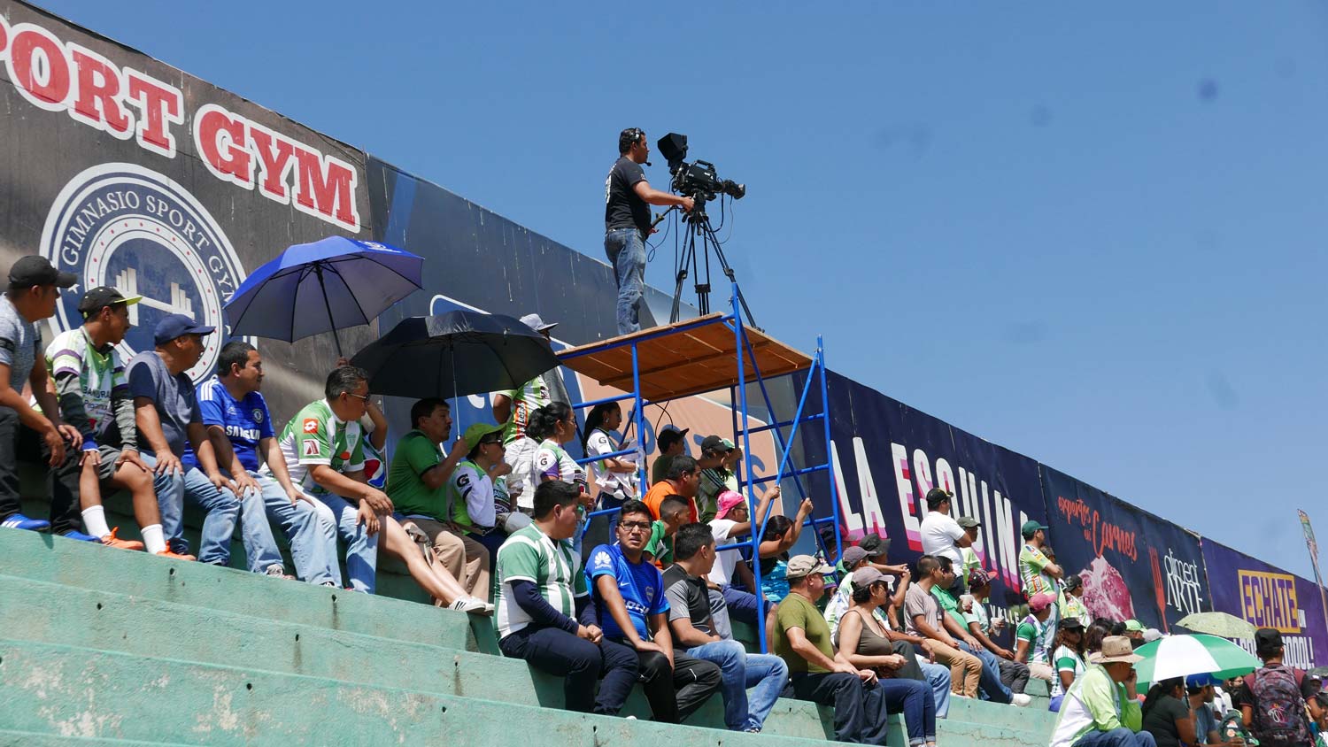 Camera man during football match in Antigua Guatemala