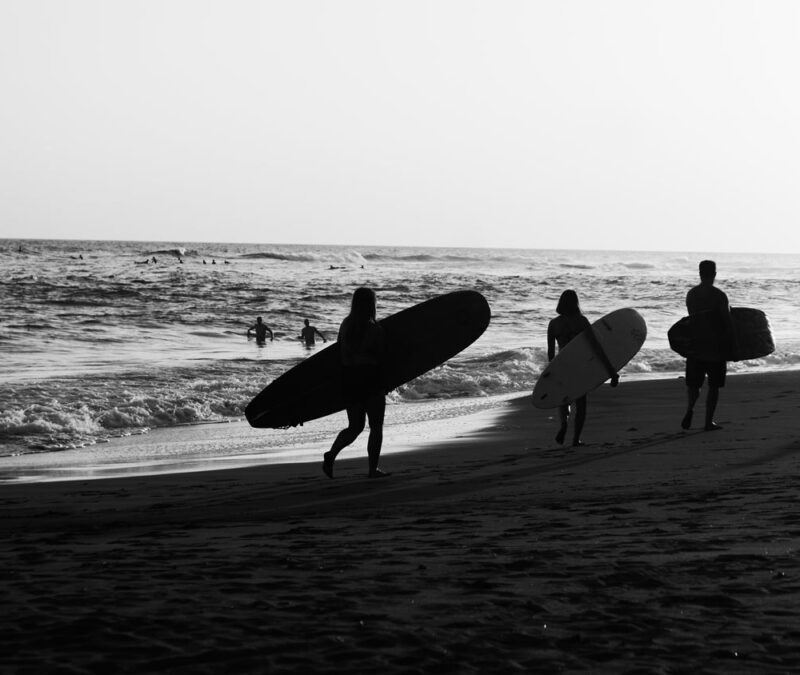 Surfers at El Sunzal beach, El Tunco village, El Salvador