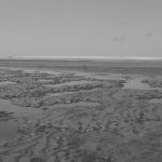 Muddy Las Penitas beach, near Leon in Nicaragua