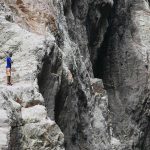 Tour guide on a rock in Somoto canyon