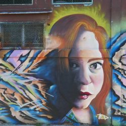 Shrewd woman. Street art in San Jose, Costa Rica
