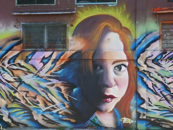 Shrewd woman. Street art in San Jose, Costa Rica