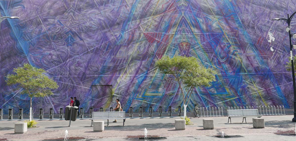 A wall full of street art near the MUSA museum in Guadalajara