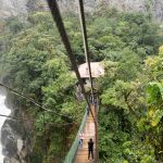 Hanging bridge in Pailon del Diablo waterfall