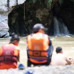 Rescue swimmers in Rio Claro reserve